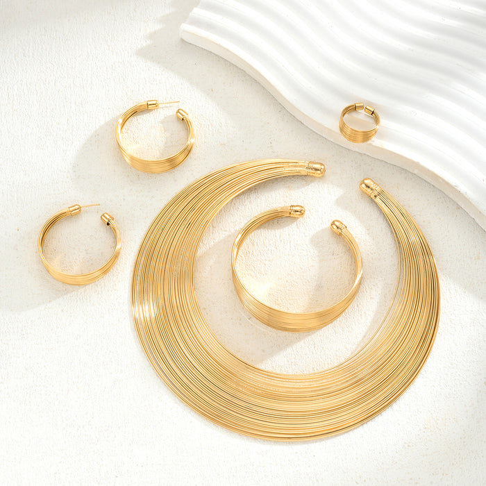 Wholesale Exaggerated metal ring-shaped multi-layered circular jewelry set.