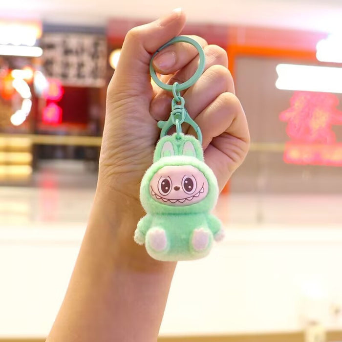 Wholesale Cute sitting posture cartoon flocked keychain