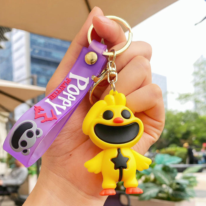 Wholesale Cute silicone smiling animal keychain