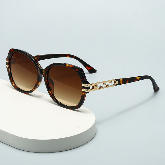 Wholesale Large frame metal sunglasses with diamond inlay, fashionable model sunscreen glasses, women's sunglasses