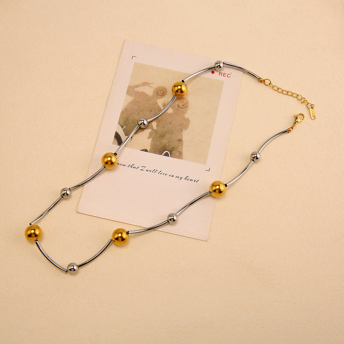 Wholesale Original design: Full body stainless steel gold and silver dual color necklace with a light luxury and high-end feel. Large ball color blocked necklace