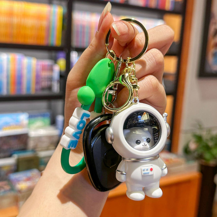 Wholesale Night light astronaut keychain romantic starry sky cute cartoon couple student backpack pendant