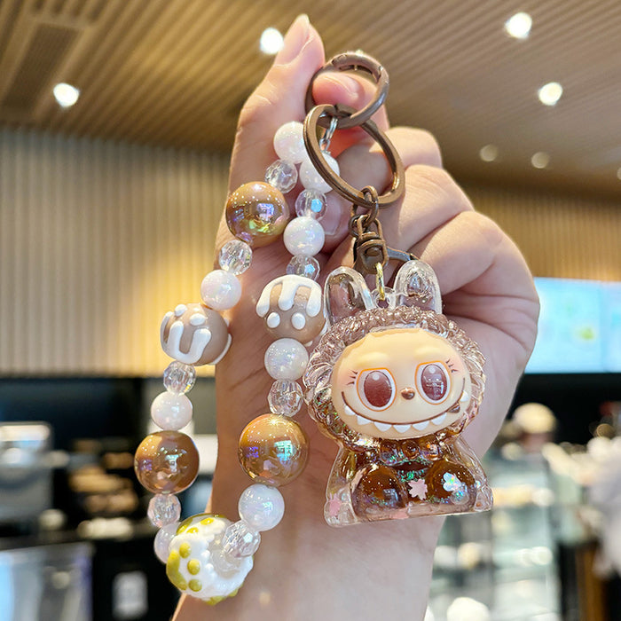 Wholesale Crystal oil-filled bottle keychain backpack charm