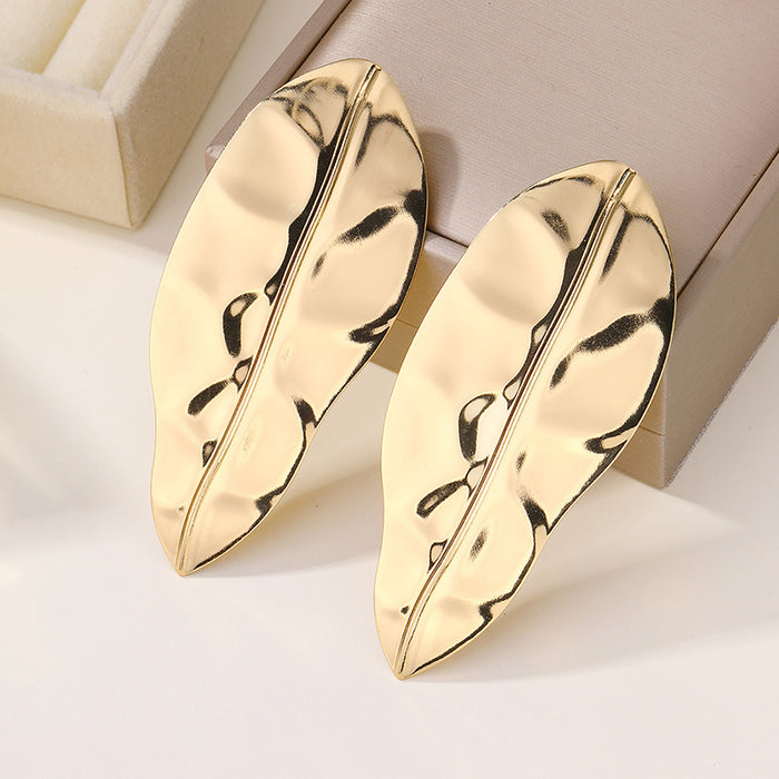 Wholesale Exaggerated alloy leaf earrings, niche folds, irregular earrings, earrings, studs