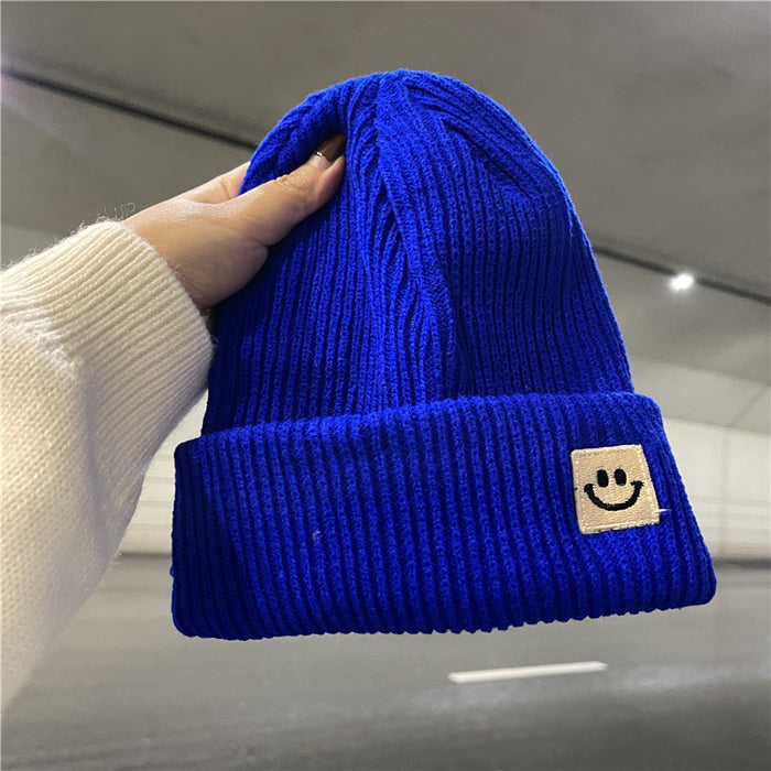 Wholesale Autumn and Winter Cute Smiley Face Logo Wool Knitted Hat JDC-FH-Yizhan002