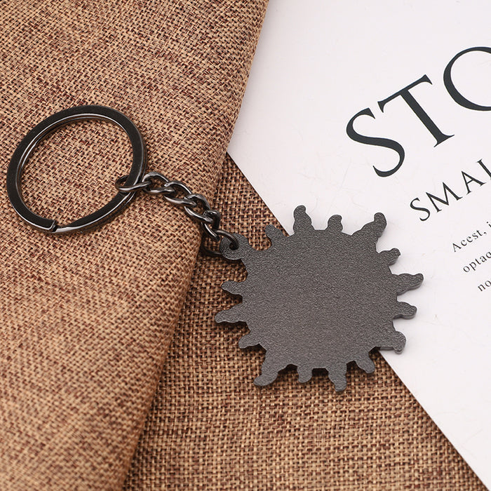 Wholesale Zinc alloy red demon face sun pendant keychains