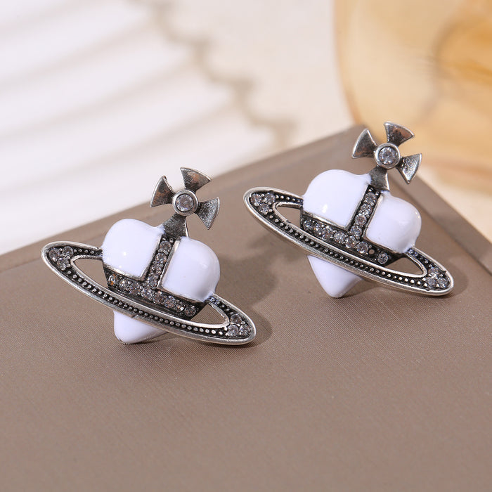 Wholesale Three-color oil-drop heart Saturn micro-inlaid zircon earrings