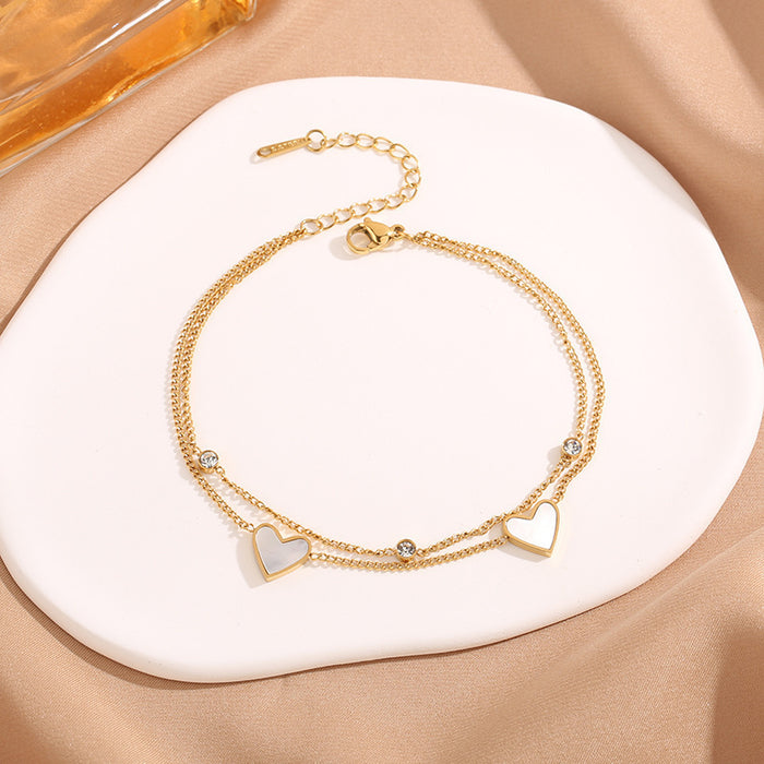Wholesale Simple and fashionable commuting, compact and versatile titanium steel bracelet, heart shaped white shell double-layer layered wearing