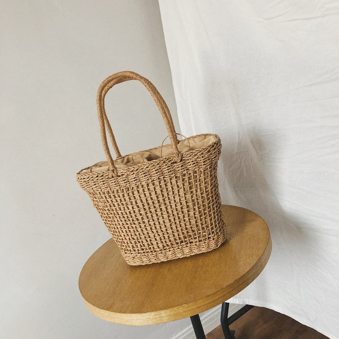 Wholesale straw bag handmade woven briefcase hollow handbag fashion beach bag