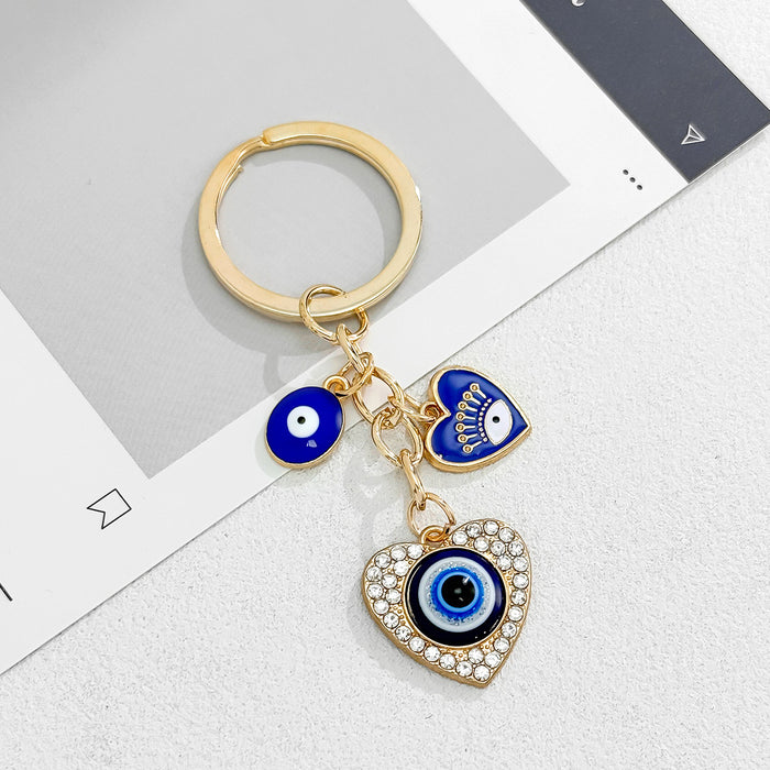 Wholesale Heart-Shaped Palm Water Drop Devil's Eye Pendant Keychain