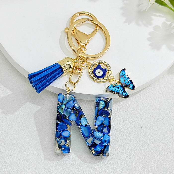 Wholesale Royal Blue 26 Letter Keychain with Evil Eye Butterfly Tassel Pendant