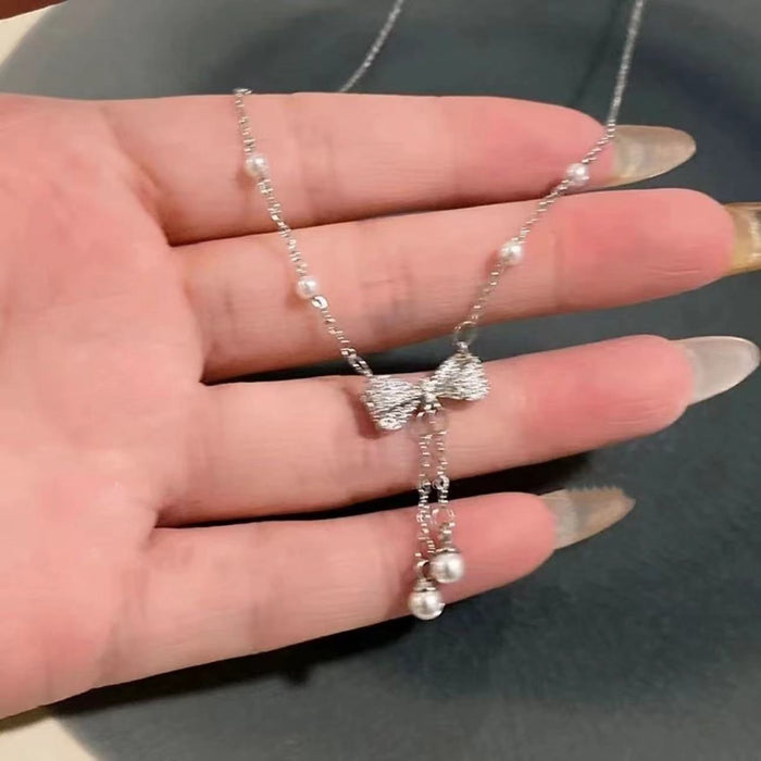Wholesale Pearl bow tassel necklace, light luxury, niche collarbone chain, high-end necklace, versatile accessories and accessories