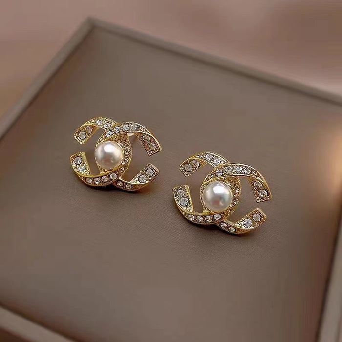 Wholesale Pearl earrings, light luxury design, high-end and elegant earrings