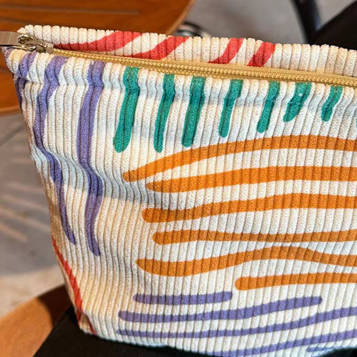Wholesale Corduroy contrasting striped makeup bag for portable travel and business trips