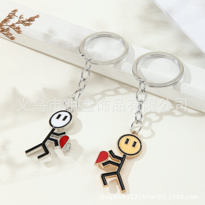 Wholesale Stick figure couple funny magnetic heart splicing keychain