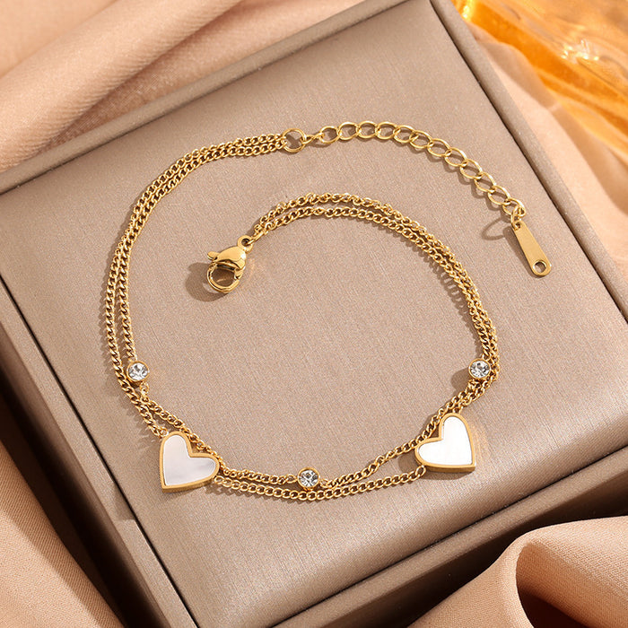 Wholesale Simple and fashionable commuting, compact and versatile titanium steel bracelet, heart shaped white shell double-layer layered wearing