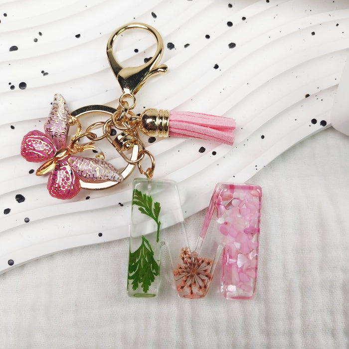 Wholesale Small Daisy Dried Flower Green Leaf Crystal Acrylic Letter Butterfly Tassel Keychain JDC-KC-JiaYi002