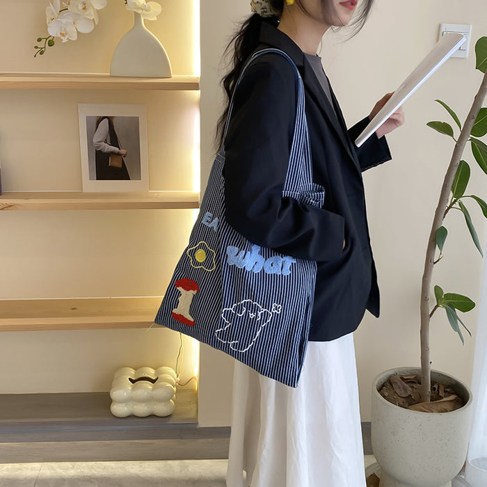 Wholesale Fashionable striped canvas bag, large capacity commuting tote bag, fashionable casual shoulder bag, cloth bag