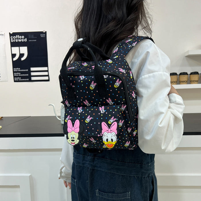 Wholesale Light pink polka dot anime cartoon backpack,  dopamine-inspired cute children' s backpack