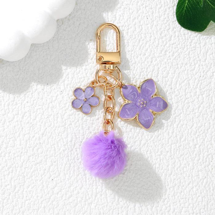 Wholesale Cute Cherry Blossom Flower Alloy Keychain Pendant Purple Decorative Accent for Resale