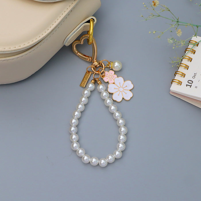 Wholesale Flower Pearl Pendant Keychain Girl Beaded Mobile Phone Chain Headset Bag Pendant