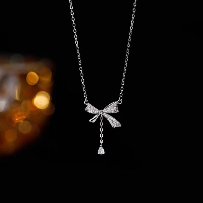 Wholesale Titanium steel necklace bow temperament versatile light luxury tassel collarbone chain accessory