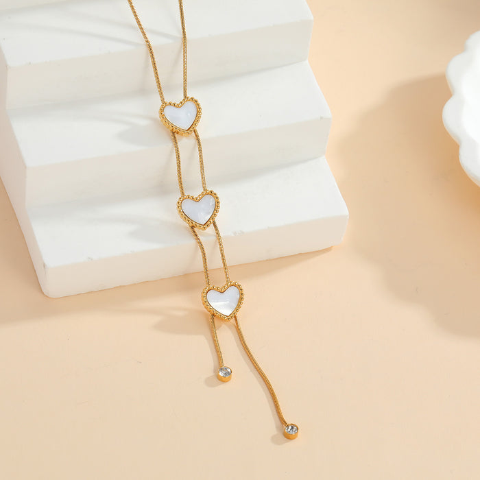 Wholesale 2pcs ong tassel heart-shaped minimalist luxury sweater chain,  colorfast titanium steel jewelry