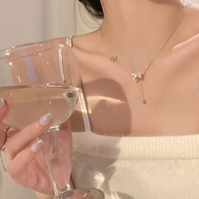 Wholesale Diamond studded bow zircon necklace, fashionable and niche design, collarbone chain pendant, necklace accessory