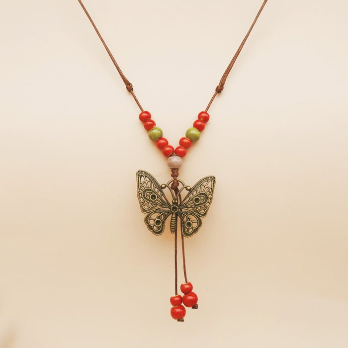 Wholesale Long sweater chain women's pendant retro butterfly necklace
