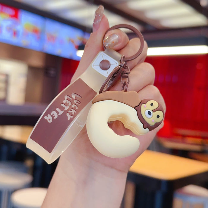 Wholesale Cartoon English alphabet animal keychains