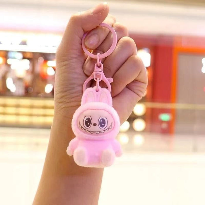 Wholesale Cute sitting posture cartoon flocked keychain