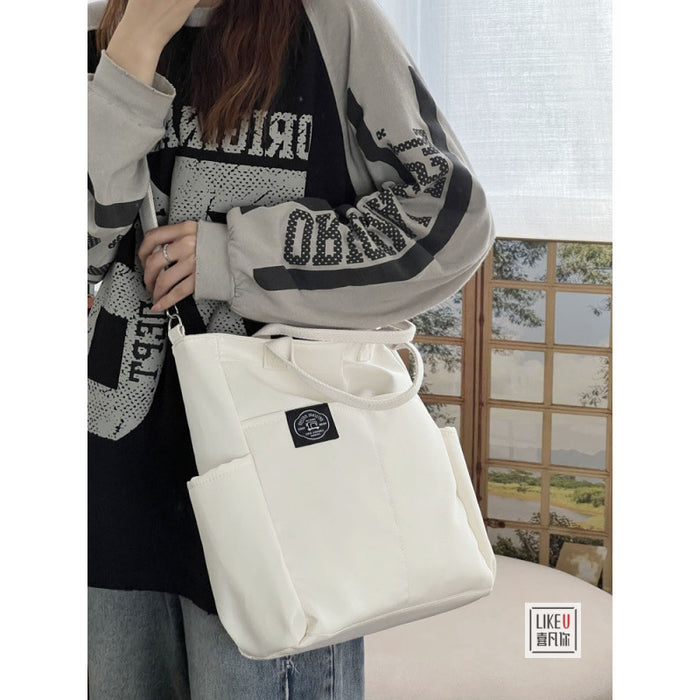 Wholesale Zipper multi-pocket casual versatile one-shoulder crossbody canvas student literary tote bag