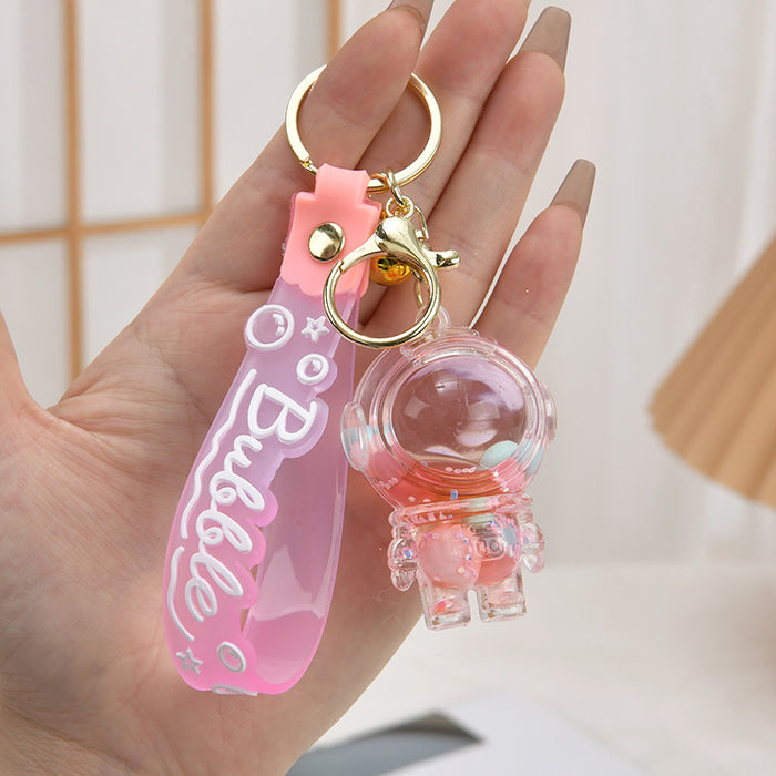 Wholesale Acrylic oil bottle candy Bean astronaut keychain