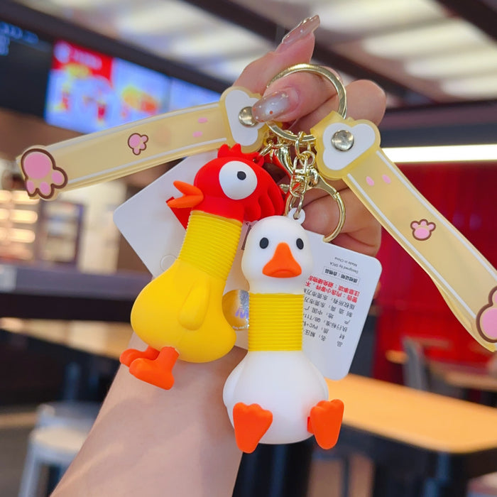 Wholesale Retractable animal pendant PVC doll keychain