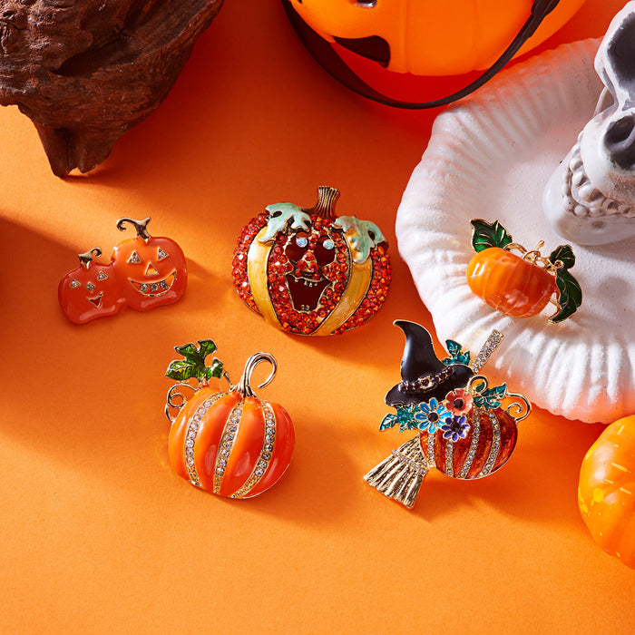 Wholesale  brooch with funny smiling pumpkin,  witch and broom painted in oil
