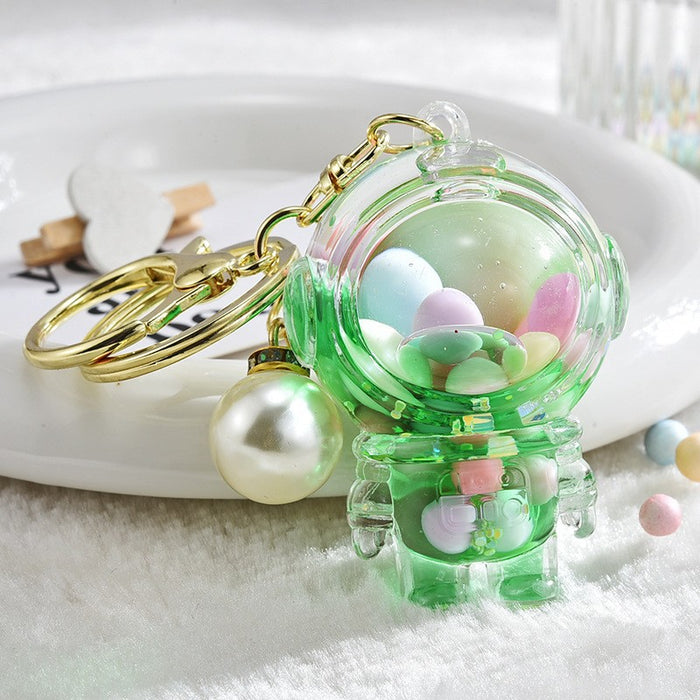 Wholesale Acrylic oil bottle candy Bean astronaut keychain