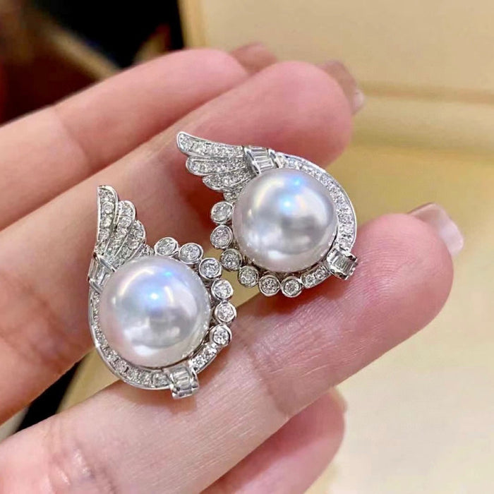 Wholesale Specially designed for niche angel wings, light luxury pearl earrings accessories, high-end pearl earrings