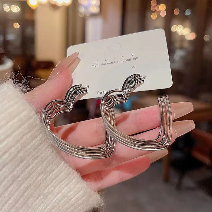 Wholesale Geometric heart-shaped exaggerated personality fashion woven earrings wholesale