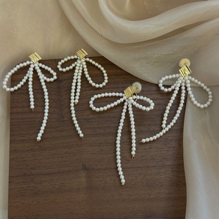 Wholesale Pearl temperament long tassel earrings, niche design, high-end long tassel ear clip