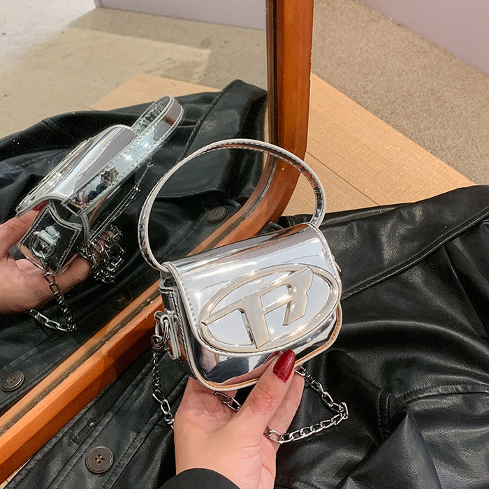 Wholesale New children's bag with glossy patent leather mini saddle bag, stylish women's chain crossbody bag, red envelope at the mouth