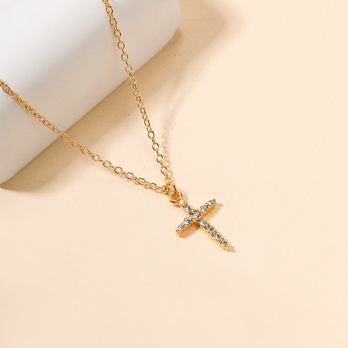 Wholesale Personalized jewelry with diamond studded alloy cross necklace, simple pendant