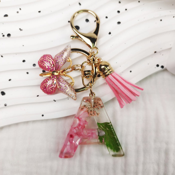 Wholesale Small Daisy Dried Flower Green Leaf Crystal Acrylic Letter Butterfly Tassel Keychain JDC-KC-JiaYi002