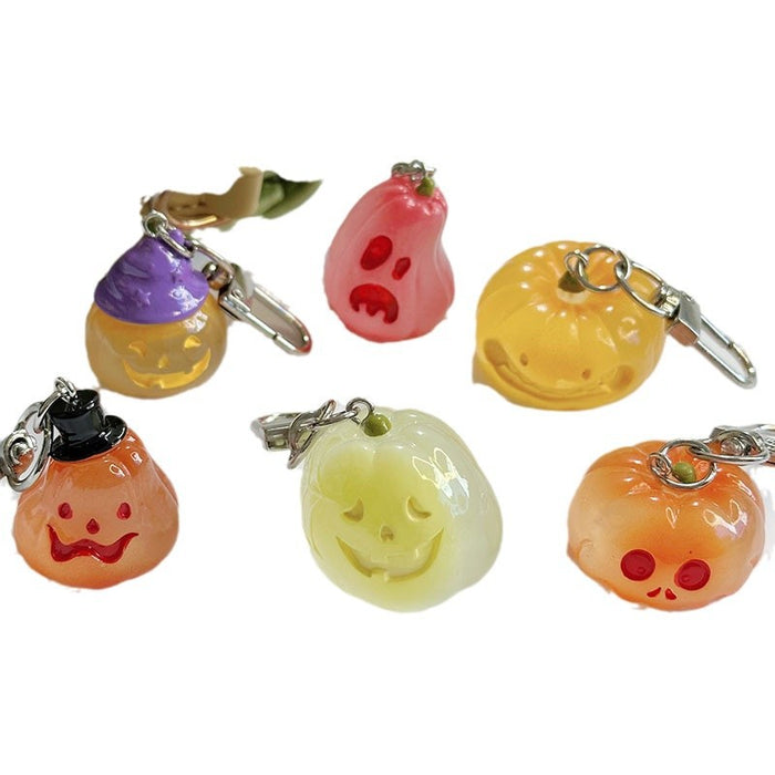 Wholesale Novelty  Pumpkin Pendant Keychain Glow In The Dark Resin Black Hat Design Bag And Earphone Case Charm Gift For Students And Couples