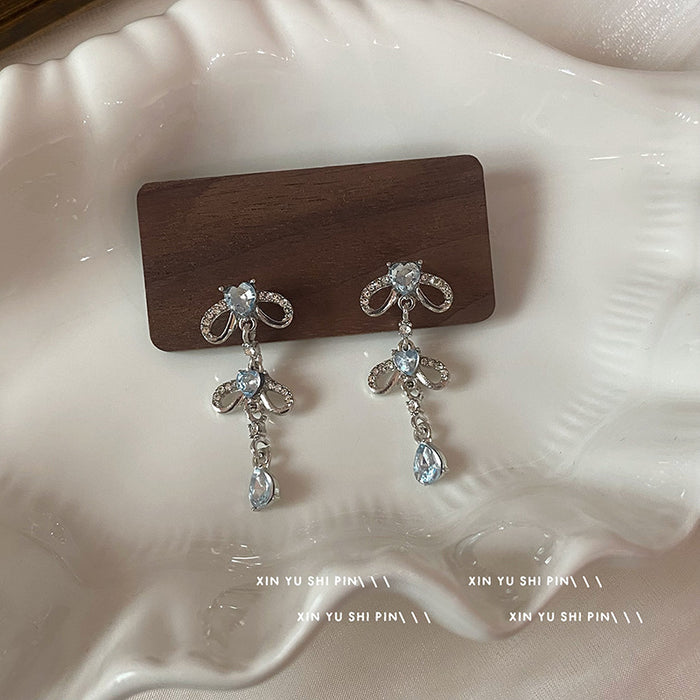 Wholesale Blue heart-shaped zircon bow earrings, niche design, exaggerated earrings, high-end water droplet pendant, long earrings