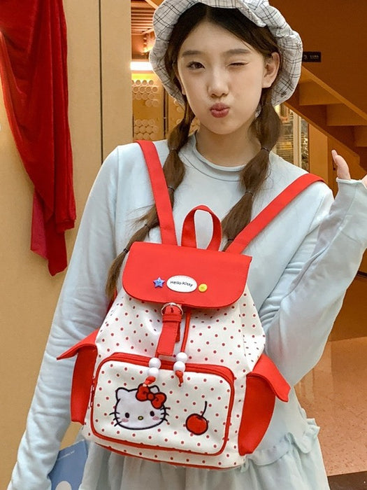 Wholesale Large capacity polka dot flap backpack with cute red kitten design