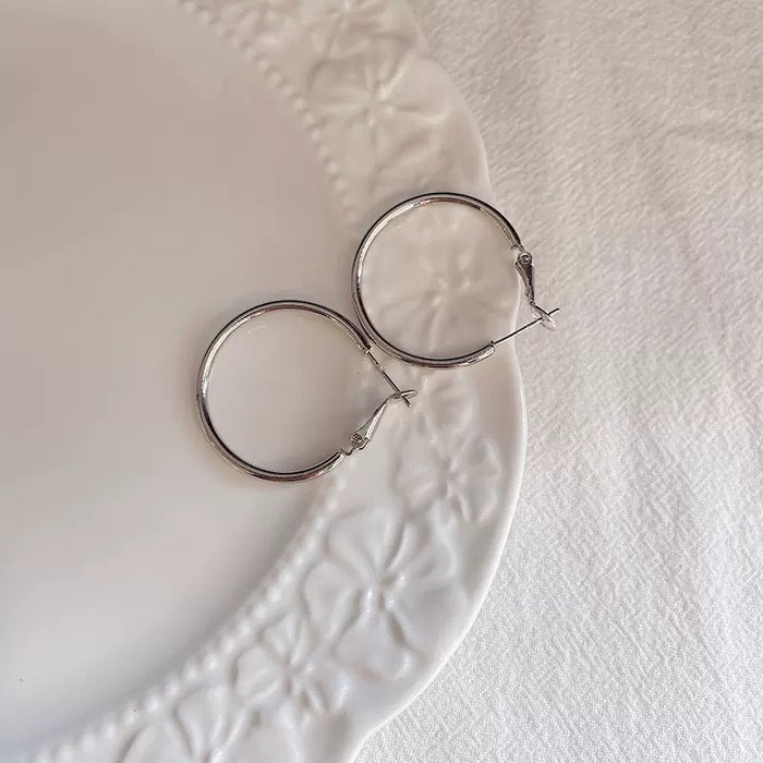 Wholesale Simple plain circle earrings, light luxury, niche earrings, high-end feel, unique temperament, ear rings