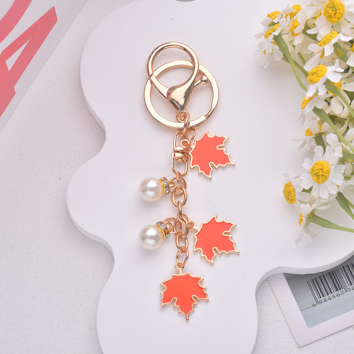 Wholesale Maple Leaf Pearl Pendant Alloy Keychain JDC-KC-Jiax002