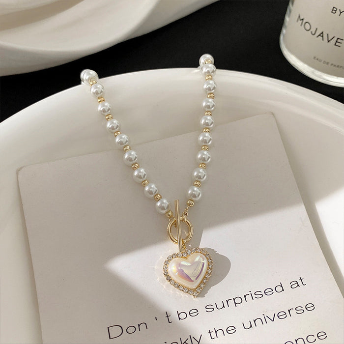 Wholesale New temperament imitation pearl heart necklace with simple collarbone chain