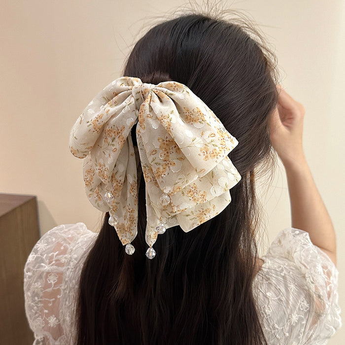 Wholesale Fragmented flower grasping clip, sweet half tied hair clip, temperament, back of the head, ponytail clip, shark clip