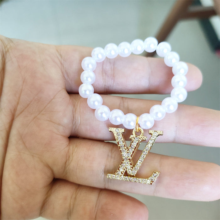 Wholesale Pendant with diamond pendant,  pearl necklace accessories,  baby clothes